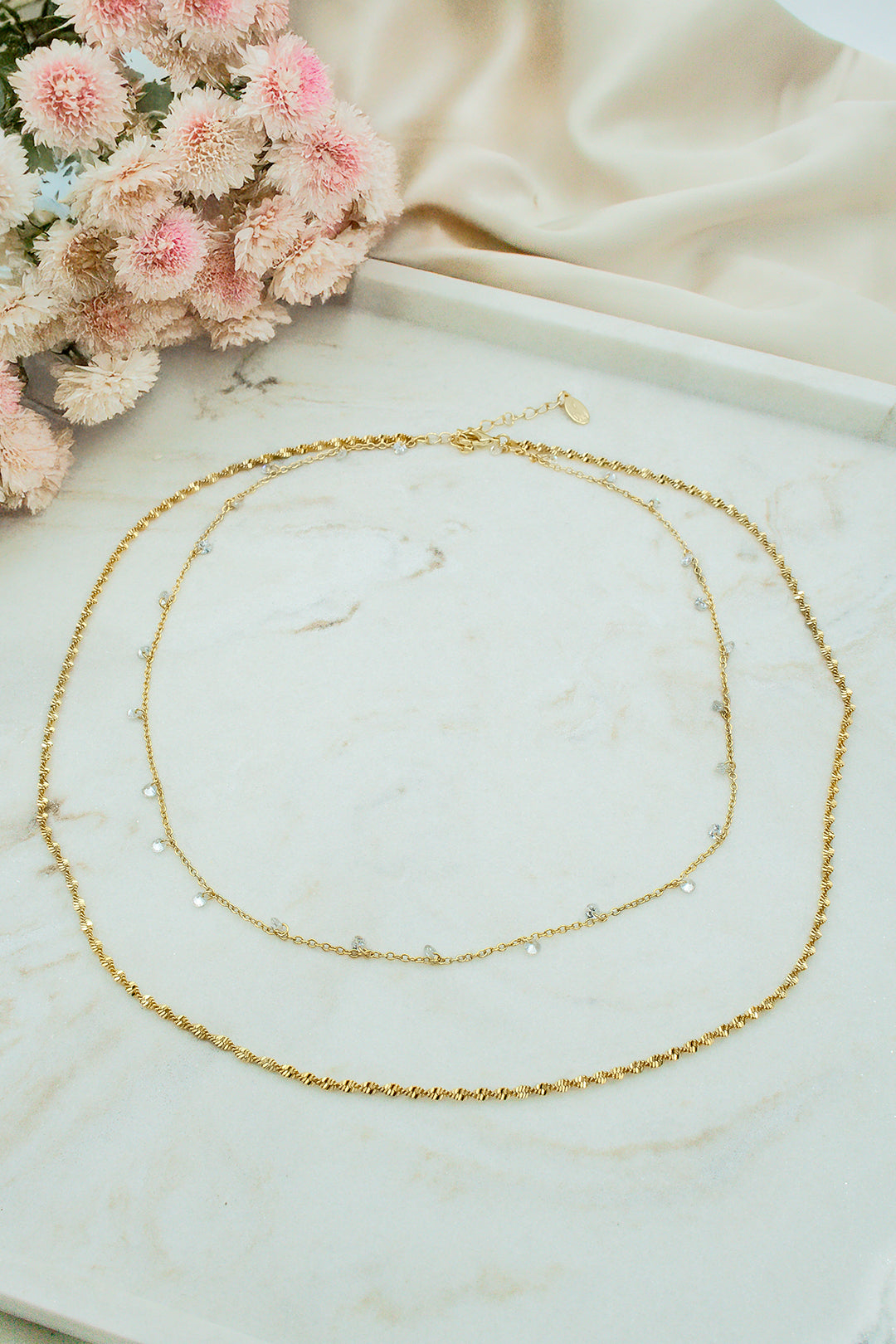 Double crystal twisted necklace