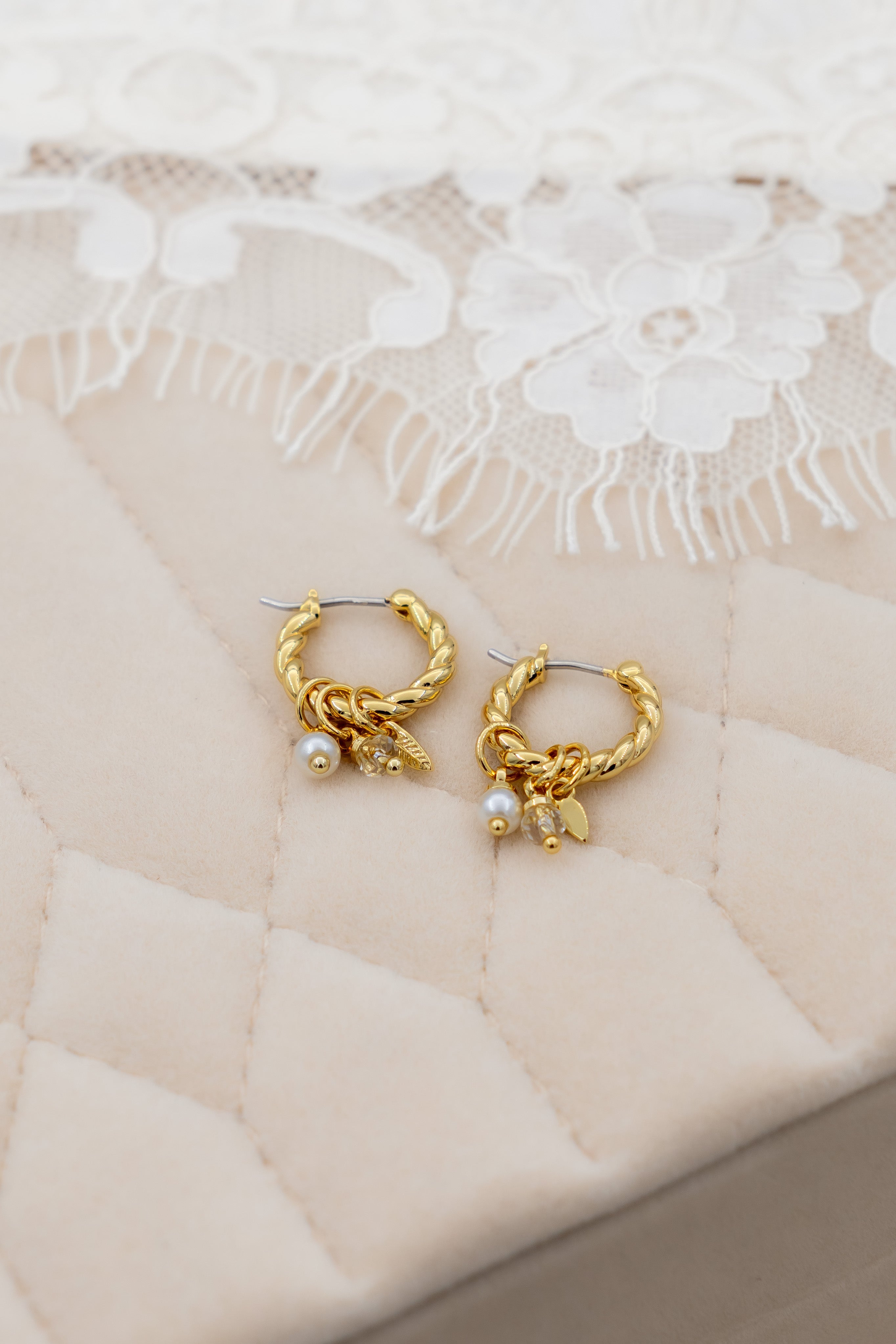 Lucente twisted charm hoops